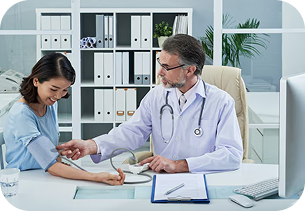 Physical Therapist assisting a patient